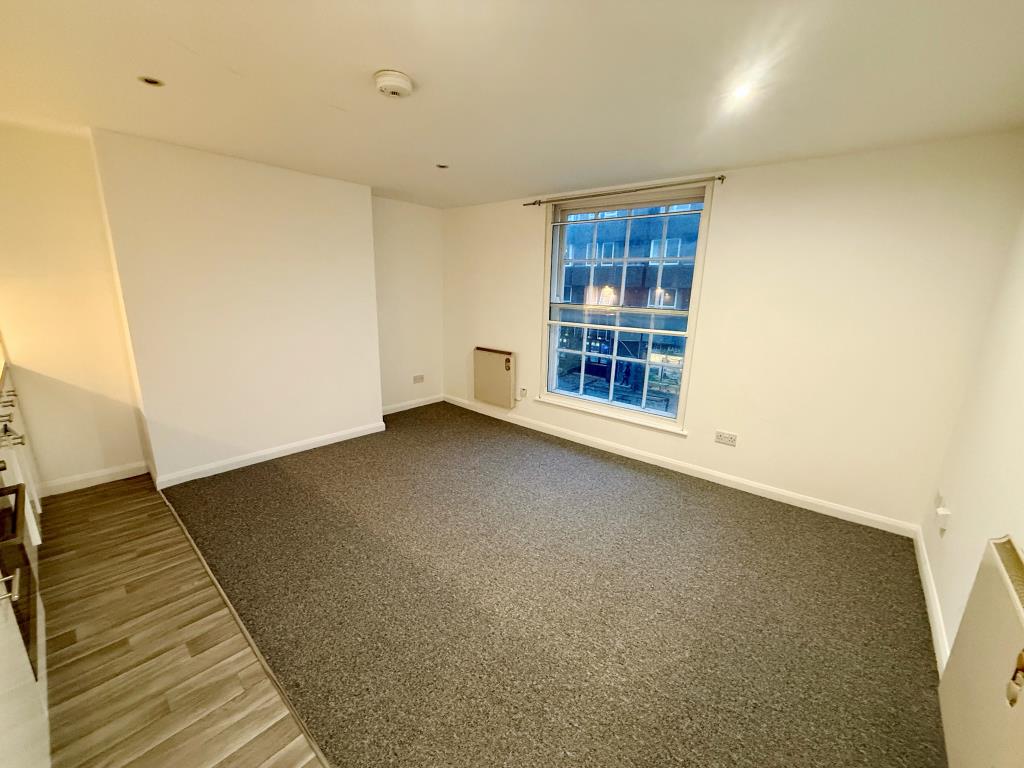 Lot: 123 - TOWN CENTRE FLAT FOR REFURBISHEMNT - Living room with kitchen